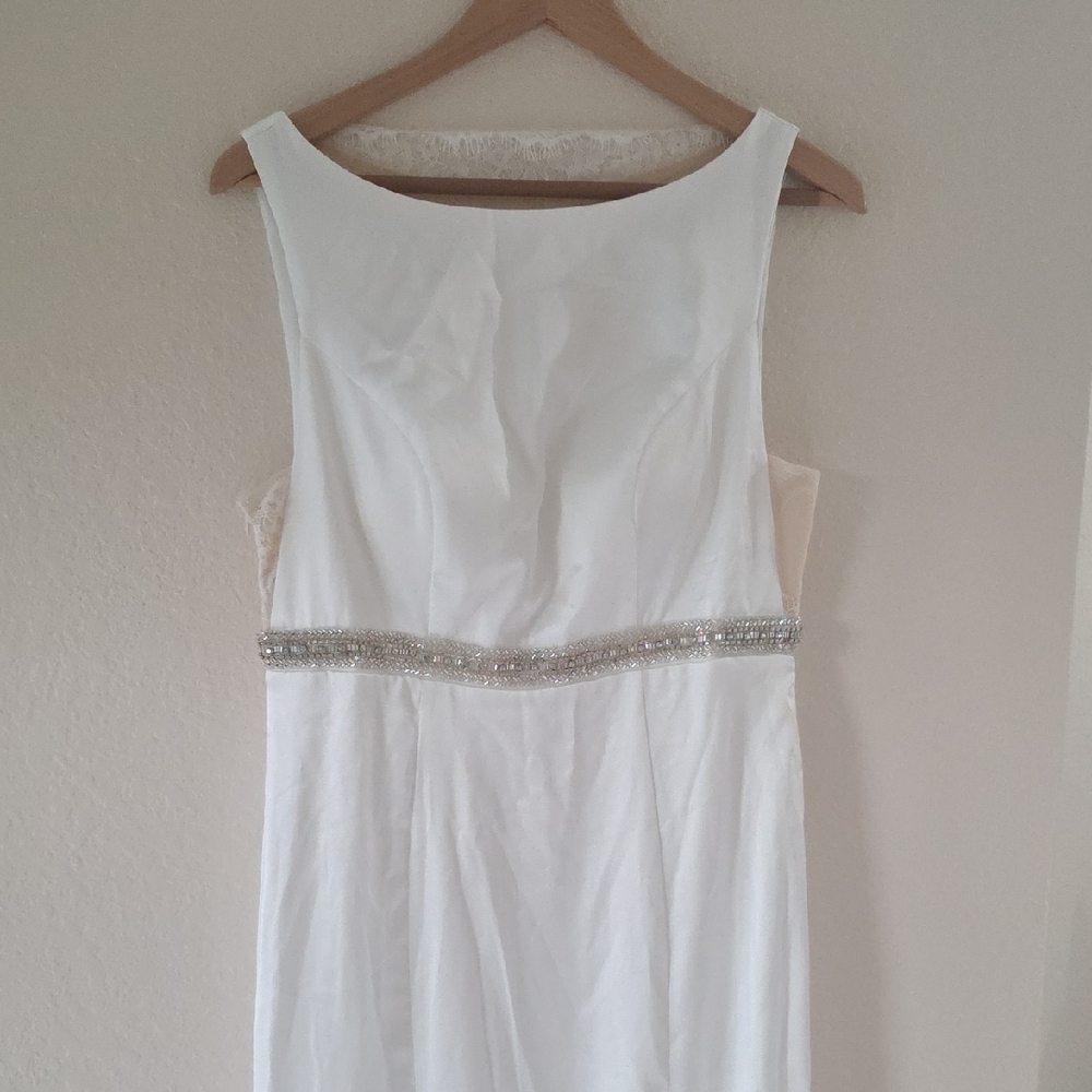 Elegant White Sleeveless Dress with Silver Accents